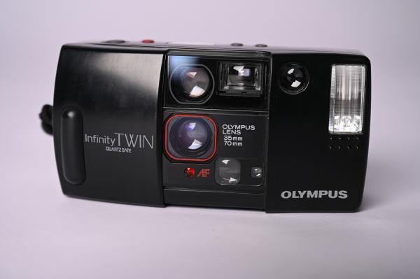 Olympus Twin Quarz Date - Gebrauchtartikel -